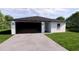 Charming single-story home with a modern design and a spacious two-car garage at 17445 Sw 25Th Ct, Ocala, FL 34473