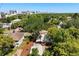 Lovely home with mature trees and landscaping, with city views in the distance at 210 E Kaley St, Orlando, FL 32806