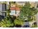 An aerial view of the property, with lush greenery and surrounding neighborhood at 210 E Kaley St, Orlando, FL 32806