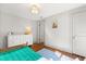Bedroom featuring hardwood floors, white walls and a white dresser at 210 E Kaley St, Orlando, FL 32806