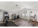 Well lit exercise room featuring hardwood flooring and a treadmill at 210 E Kaley St, Orlando, FL 32806