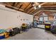 Spacious garage with high ceiling and storage, ideal for parking and hobbies at 210 E Kaley St, Orlando, FL 32806