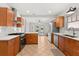 Bright kitchen featuring stainless appliances, tile flooring and white subway tile backsplash at 210 E Kaley St, Orlando, FL 32806