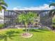 Lush backyard with a screened pool, spacious patio, and beautiful landscaping, perfect for outdoor living at 2145 Plantation Oak Dr, Orlando, FL 32824