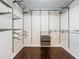 Organized walk-in closet with adjustable shelving and drawers to maximize storage capacity and efficiency at 2145 Plantation Oak Dr, Orlando, FL 32824