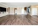 Spacious living room with hardwood floors, recessed lighting, and neutral paint at 2145 Plantation Oak Dr, Orlando, FL 32824
