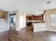 Open-concept living space with breakfast bar, seamlessly connecting the kitchen and living areas at 2145 Plantation Oak Dr, Orlando, FL 32824