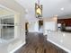 Open-concept living space with breakfast bar, seamlessly connecting the kitchen and living areas at 2145 Plantation Oak Dr, Orlando, FL 32824