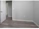 Bright bedroom with light gray walls, white trim, wood-look floors, and ample natural light at 2259 3Rd Ave, Deland, FL 32724