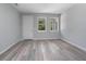 Bright room with wood-look flooring and a closet door at 2259 3Rd Ave, Deland, FL 32724
