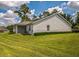 The backyard features a well-maintained lawn and a covered patio area at 2503 Se 18Th Cir, Ocala, FL 34471
