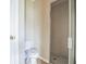 Small bathroom with a glass walk-in shower and a neutral toilet at 2503 Se 18Th Cir, Ocala, FL 34471