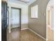 The dining area leads to the entryway of this home, with views of the front door at 2503 Se 18Th Cir, Ocala, FL 34471