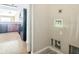 Laundry room is located off the kitchen near additional storage at 2503 Se 18Th Cir, Ocala, FL 34471