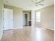 Large main bedroom offers a ceiling fan, natural light, and neutral colored walls at 2503 Se 18Th Cir, Ocala, FL 34471