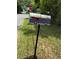 Bus-shaped mailbox in the front yard of the property at 2520 Raehn St, Orlando, FL 32806