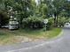 Exterior street view of the property with an RV in the yard at 2520 Raehn St, Orlando, FL 32806