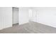 Bedroom featuring neutral carpet and an open closet at 2774 Virginia Pine Dr, Bartow, FL 33830