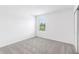 A standard bedroom with neutral carpet, a closet and natural light at 2774 Virginia Pine Dr, Bartow, FL 33830