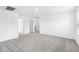 A bright and spacious living room featuring neutral carpet and ample natural light at 2774 Virginia Pine Dr, Bartow, FL 33830
