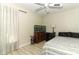Bedroom with hardwood floors, natural light, a ceiling fan, and a decorative ceiling fan at 304 Little Springs Ln, Longwood, FL 32750