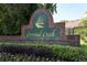 Welcoming Crystal Creek neighborhood sign with lush landscaping and brick facade at 304 Little Springs Ln, Longwood, FL 32750