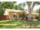 Charming single-story home featuring a landscaped yard and a side-entry garage at 304 Little Springs Ln, Longwood, FL 32750