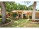 Charming single-story home featuring a landscaped yard and inviting front porch at 304 Little Springs Ln, Longwood, FL 32750