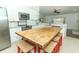 Spacious kitchen with a large island and stainless steel appliances at 304 Little Springs Ln, Longwood, FL 32750