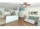 Bright, open-concept floor plan showing the kitchen and the living room area at 304 Little Springs Ln, Longwood, FL 32750