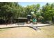 Community playground featuring swings, slides, and a covered picnic area for Gathering fun at 304 Little Springs Ln, Longwood, FL 32750