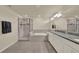 Bright bathroom with a tiled floor, a soaking tub, walk-in shower, granite countertops, and dual sinks at 3259 Buoy Cir, Winter Garden, FL 34787