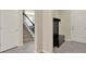A tiled entryway includes stairs, a storage bench, and an exterior door at 3259 Buoy Cir, Winter Garden, FL 34787