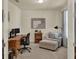 Cozy home office featuring a wooden desk, comfortable chair, and a relaxing lounge area at 3259 Buoy Cir, Winter Garden, FL 34787