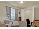 Comfortable home office space featuring a cozy lounge area, wooden desk, and ample natural light at 3259 Buoy Cir, Winter Garden, FL 34787