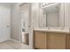 Bathroom featuring a vanity with a single sink, tile flooring, and a doorway to a bedroom at 386 Riggs Cir, Davenport, FL 33897