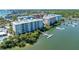 Waterfront condo community featuring private boat docks, lush landscaping, and stunning water views at 5 Riverwalk Dr # 604, New Smyrna Beach, FL 32169
