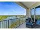 Relax on the private balcony with comfortable seating, enjoying the scenic waterfront and mangrove views at 5 Riverwalk Dr # 604, New Smyrna Beach, FL 32169