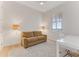 Bedroom with a sofa, natural light, shutters, and a ceiling fan at 5 Riverwalk Dr # 604, New Smyrna Beach, FL 32169