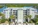 Stunning waterfront condominium complex boasts manicured landscaping, covered parking, and access to coastal waterways at 5 Riverwalk Dr # 604, New Smyrna Beach, FL 32169