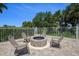Community fire pit and seating area providing cozy gathering space for residents at 5 Riverwalk Dr # 604, New Smyrna Beach, FL 32169