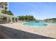 Inviting community pool featuring a charming gazebo, ample seating, and lush landscaping, perfect for relaxation at 5 Riverwalk Dr # 604, New Smyrna Beach, FL 32169