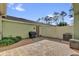 This backyard features an outdoor patio, brick flooring, and is perfect for entertaining at 6218 Forsythe Loop, Sanford, FL 32771