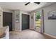 Neutral bedroom with a large window, closet, and modern artwork at 731 Rosemere Cir, Orlando, FL 32835