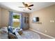 Cozy living room with a large window, stylish decor, and comfortable seating at 731 Rosemere Cir, Orlando, FL 32835