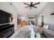 Inviting living room with an open floor plan that leads into the kitchen at 731 Rosemere Cir, Orlando, FL 32835