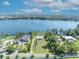 Aerial view of property, showcasing the home and lakefront access at 7420 Lake Willis Dr, Orlando, FL 32821