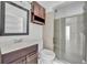 Stylish bathroom with modern fixtures, including a sleek vanity and a glass-enclosed shower at 7420 Lake Willis Dr, Orlando, FL 32821