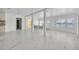 Open-concept living area featuring a view of the lake, and sleek flooring at 7420 Lake Willis Dr, Orlando, FL 32821