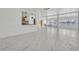 Bright and spacious living room with tile floors and lake view at 7420 Lake Willis Dr, Orlando, FL 32821